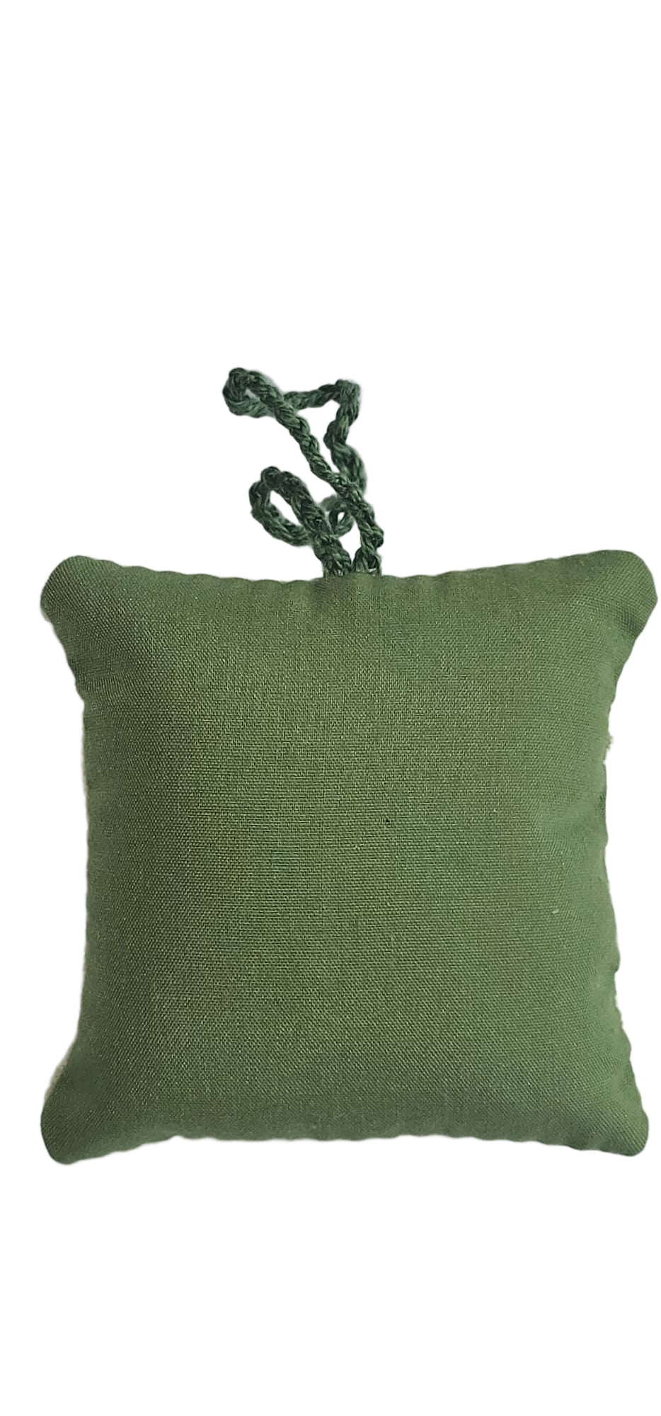 Green fabric square with a string on a white background