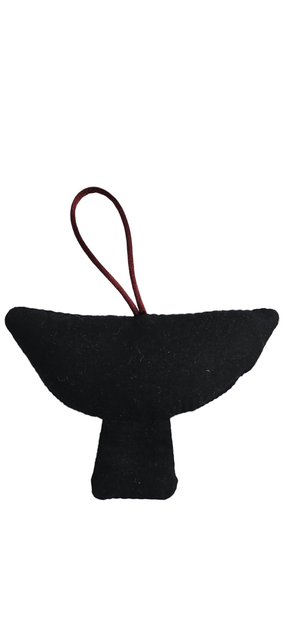 Black fabric whale tail with a red string on a white background