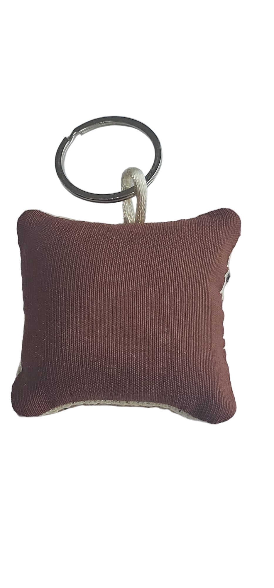 Brown square keychain with a metal ring on a light gray background